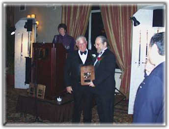 Richard receiving the Silver Award from Ron Blatt for his creation - Athena.
